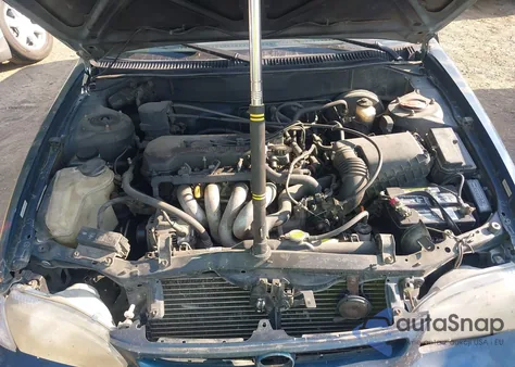 1998 Toyota Corolla Le from USA, damaged, VIN 1NXBR18E2WZ016671